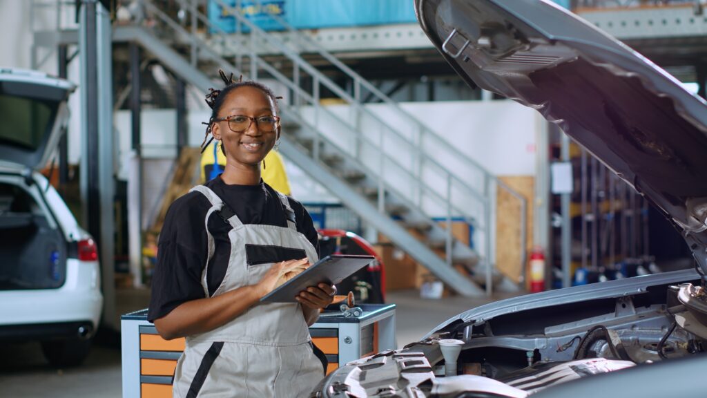 A smiling woman who knew all about the vehicle reconditioning. 